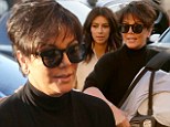 Three generations! Kris Jenner carries baby North West as she joins Kim Kardashian for family dinner