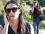 Youthful appeal: Demi Moore dressed younger than her 51 years of age with a tattered pair of jeans as she attended a friend's birthday bash in Beverly Hills, California on Saturday