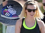 Reese Witherspoon attempts to pull of bright fashionable trainers on an LA stroll with her teenage son, Deacon
