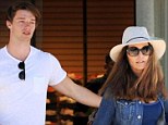 Genetically-blessed: Maria Shriver, pictured in Brentwood, California, last week, joked that she is trying to keep her hunky son Patrick Schwarzenegger's ego in check when it comes to his dashing good looks