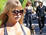 Goldie Hawn looks posture-perfect in skin tight workout clothes while on a Sunday stroll with a friend