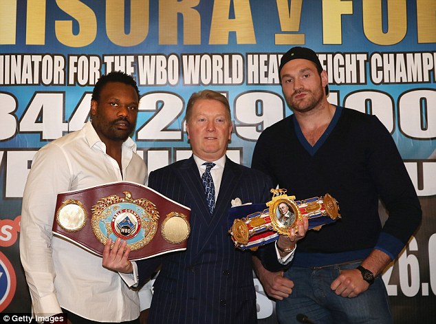 Serious business: Frank Warren announces the rematch between Dereck Chisora and Tyson Fury