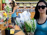 Blooming lovely! Cara Santana doesn't need fianc Jesse Metcalfe to buy her flowers as she hits the shops to load up on colourful bouquets