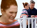 Suffering for her art! Julianne Moore grimaces with cold as she films beachside scene with Alec Baldwin