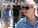 Diane Kruger shows off her slender legs in denim minidress while out shopping with boyfriend Joshua Jackson