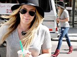 Talk about ripped! Hilary Duff displays the results of her almost daily workouts in a pair of VERY tight, frayed jeans