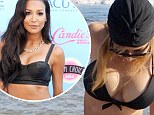 Did she get a breast job? Glee's Naya Rivera busts out of skimpy bikini... and looks THREE bra sizes bigger than she did just two months ago