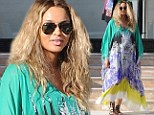 Now you see it, now you don't: Heavily pregnant Ciara - who is believed to be due next month - completely drowned her bump in a flowing dress while out shopping at Barneys New York in Beverly Hills