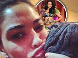 Good to be home! Supermodel Shanina Shaik returns from Sweden to cuddle up to her puppy Choppa