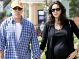 Big day, small celebration! Bruce Willis and his very pregnant wife Emma Heming mark their fifth wedding anniversary with a stroll in the sunshine