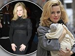Handle With Care! Melissa George holds on tight to her newborn son Raphael as she continues work on her movie in New York