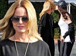 Back in black! Mena Suvari was dressed to impress for a lunch date with a girlfriend in West Hollywood on Thursday