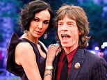 Mick Jagger reportedly left L'Wren Scott behind on the latest Rolling Stones world tour because his bandmates branded her the group's Yoko Ono