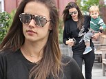 'My joy!' Alessandra Ambrosio gets an arm workout as she carries growing son while shopping after posting loving snap together