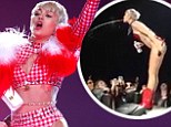 Showering her audience! Miley Cyrus spits water onto her fans during concert ... to huge cheers