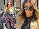 'Blonde b****y babe!' Khloe Kardashian reveals bleached waist-length locks after hitting the gym in figure-hugging leggings