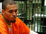 'I feel like a caged animal!' Chris Brown 'is scared straight in jail as he pursues civil settlement to avoid prison'