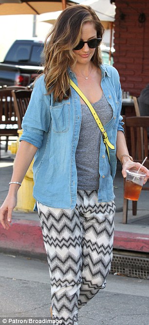 Casual lunch: The Just Go With It star wore her pretty smile with a light blue denim button-up shirt over a grey T-shirt with patterned zig-zag pants and flip flops as she walked back to her car after lunch