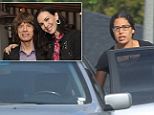 Mick Jagger's eldest daughter Karis has emerged from the house where her bereaved father is believed to be staying as he plans the Los Angeles funeral for L'Wren Scott.