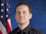 Fallen hero: Officer Robert German was shot and killed early Saturday after stopping two people and calling for help