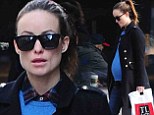 Bumpin' in blue! Pregnant Olivia Wilde looked uber-chic as she stepped out in New York's West Village on Thursday