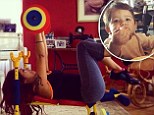 Pushing yourself? Snooki Instagarmmed an image of her playing with her one-year-old son Lorenzo's toy bench press set on Friday, after enjoying a healthy breakfast with her '2 studs'