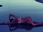 Using that bod' for good! Nicole Trunfio promotes World Water Day with a provocative beach side snap