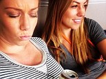 Kendra Wilkinson's friend Jessica Hall rests a beer on her bump while at NASCAR