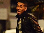 Out and about: Chris Smalling is pictured in the early hours of Saturday morning leaving a bar