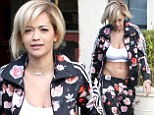 Rita Ora dons a fashionable floral print Adidas track suit as she leaves Blushington Makeup & Beauty Lounge