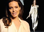 Ray of light! Angelina Jolie glows in ivory pantsuit to promote her film Unbroken at Las Vegas event