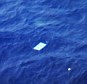 Five military planes have spotted 'multiple objects of various colours' in a new search area in the Indian Ocean, but officials say it will take until tomorrow to determine whether they are related to the Malaysia Airline plane