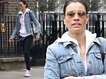 'Arms, abs and back... Have it!': Melanie Sykes teams black leggings and pink vest with pale denim jacket as she heads to the gym