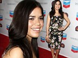 America Ferrera flashes a smile as she displays her slender figure in a pretty floral frock at the Cesar Chavez Awards
