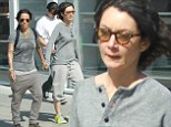 Coordinated: Sara Gilbert and her fiancé Linda Perry both dressed in head-to-toe grey and held hands as they went shopping in Beverly Hills