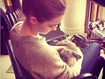 Emma Watson gets cosy with a cute bunny ahead of Noah film premiere