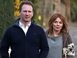 Geri Halliwell links arms with her new man Red Bull Racing Formula One Team Principal Christian Horner as they enjoy a romantic stroll