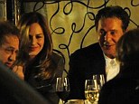 In good cheer: Charles Saatchi appears to be in good spirits as he and former TV stylist Trinny Woodall dine out with pals on Friday evening
