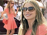Sofia Vergara is picture perfect in flirty dress, matching heels and Chanel purse
