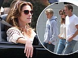 Soaking up the California sun! Cindy Crawford took a joy ride in a convertible truck with her husband Rande Gerber and son Presley in Malibu on Saturday