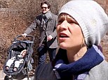 Who's that girl? Actress Claire Danes tucks her hair into a cap while on a walk with Hugh Dancy and their son in Toronto Sunday