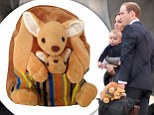 Young Prince gets a kangaroo backpack on very brief stop in Sydney with his parents