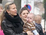 Caprice spotted out and about with her baby sons in London