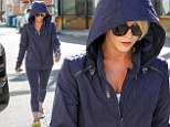 Fitness fan:  Julianne Hough is coy as she hides under hood as she leaves gym session