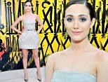 She shamelessly stylish: Emmy Rossum stuns on the red carpet in pastel tulip dress as she shows off her slender pins