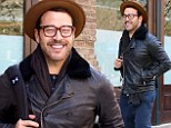 Spring stroll: Jeremy Piven enjoyed a walk in New York City on Tuesday wearing a brown fedora and glasses