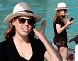 Bea at sea: Princess Beatrice keeps her cool on board a boat whilst boyfriend Dave Clark makes a splash on a lilo in St Barts