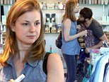 Sweet smell of Revenge! Emily VanCamp gets help picking out the perfect scent from beau Josh Bowman while perfume shopping
