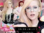 Avril Lavigne shows off her slim figure in plunging leather bodice in new Japanese techno inspired video Hello Kitty