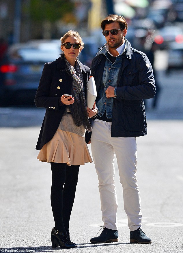 Out and about: Olivia Palermo and her fiancé Johannes Huebl teamed up to hail a taxi cab in New York City on Monday